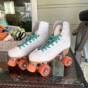 Impala White Roller Skates with Teal Laces and pink wheels